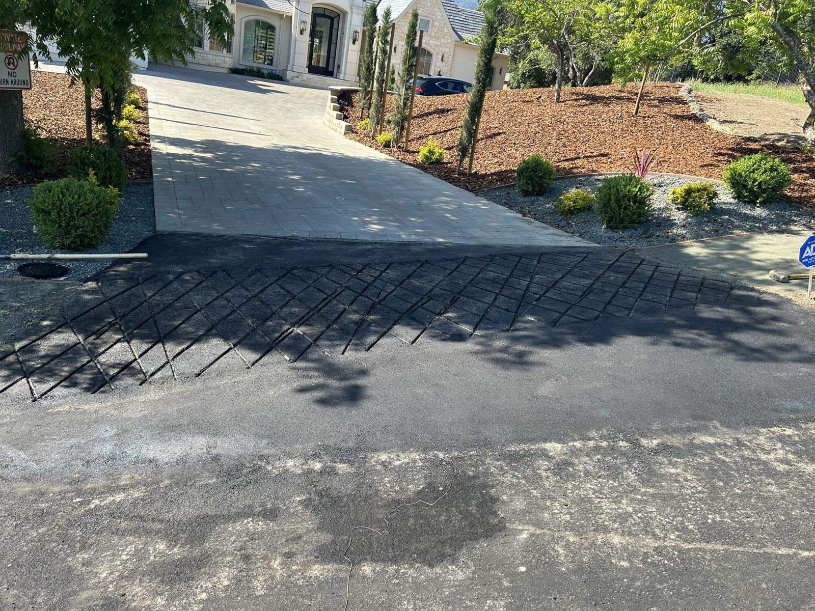 New residential asphalt driveway