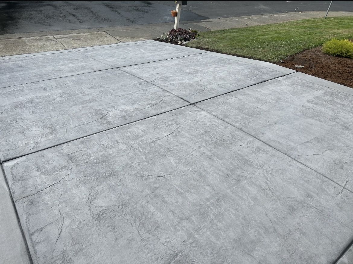 Asphalt driveway approach to a home